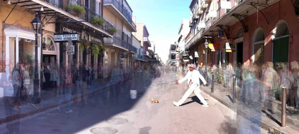 Man walking a dog on Royal Street in New Orleans