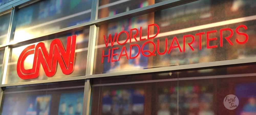 Closeup of a sign that says "CNN World Headquarters."