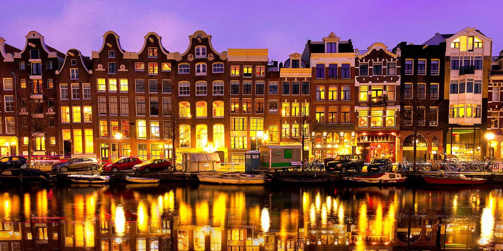 Stroll along the beautiful canals of Amsterdam in the Netherlands.