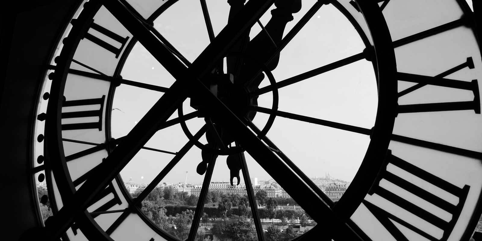 Closeup of the giant clock-slash-window from inside Musée d'Orsay in Paris, France.