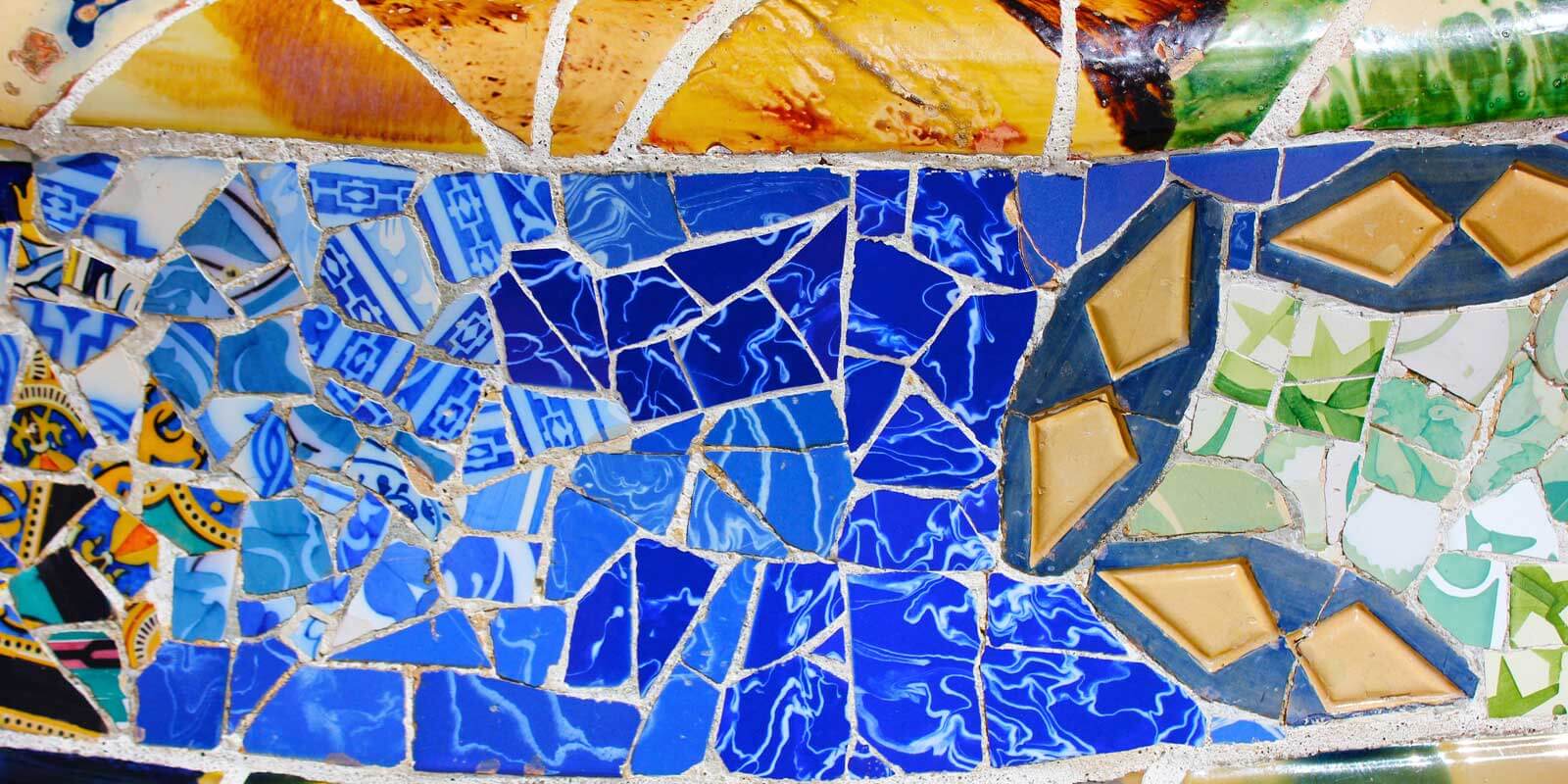 Closeup of crushed Spanish tile mosaic at a park in Spain.
