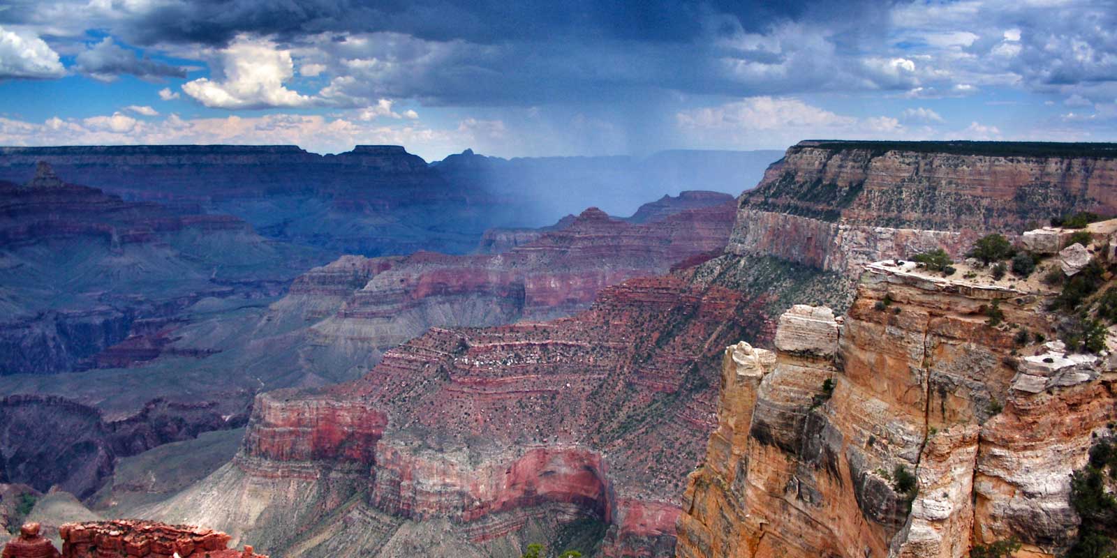 Close up of the Grand Canyon with dark and cloudy skies
