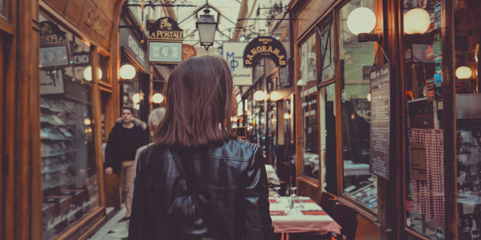 Woman browsing through a shopping hall in Paris, France.