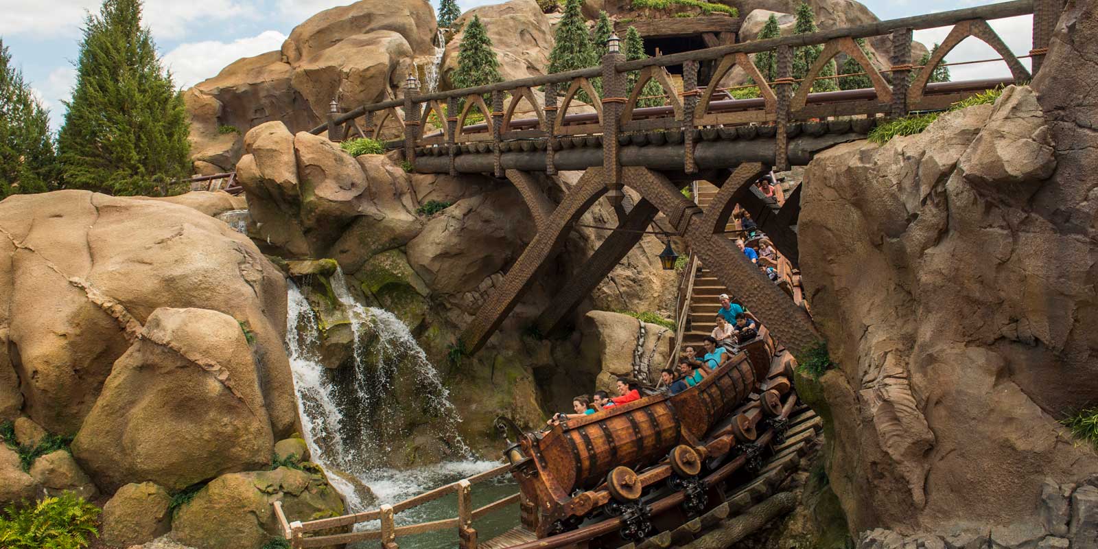 Photo of people enjoying the Seven Dwarves Mine Train at Magic Kingdom.