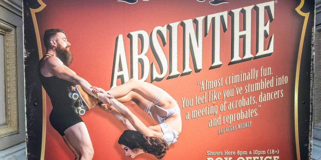 Photo of a promotional sign for the Vegas variety show, Absinthe.