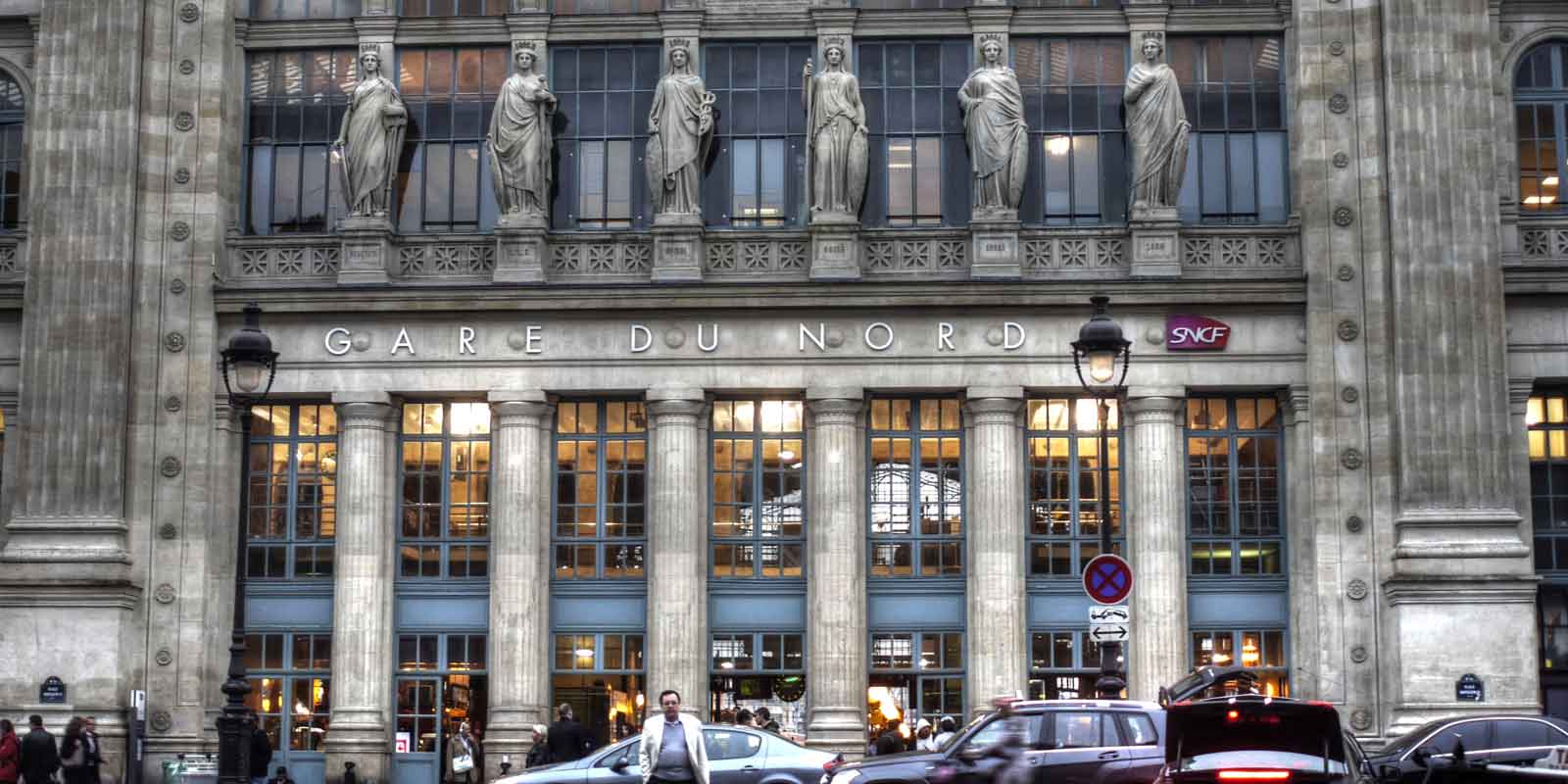 Landscape view of the outside of the Gare du Nord station in Paris, France.