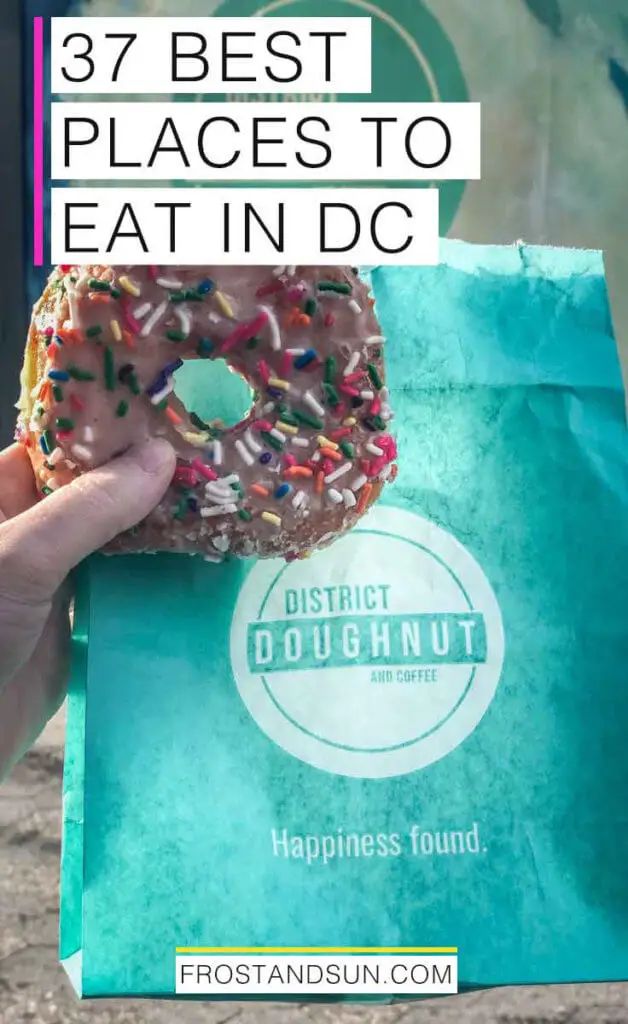 A sprinkle-covered donut held in front of a teal blue bag from District Doughnut. Overlying words read "37 best places to eat in DC."