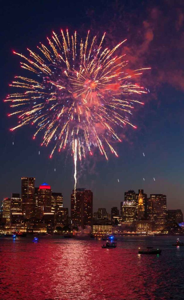 Fireworks burst over the Charles River for the Boston Pops Fireworks Spectacular.