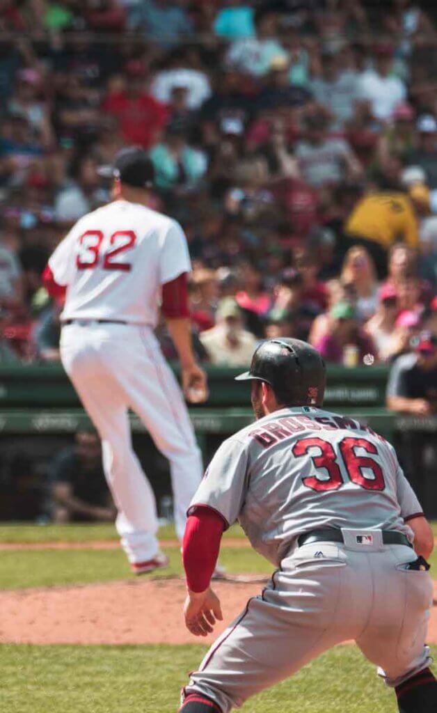 The Boston Red Sox, featuring pitcher Matt Barnes in #32, playing at Fenway Park.