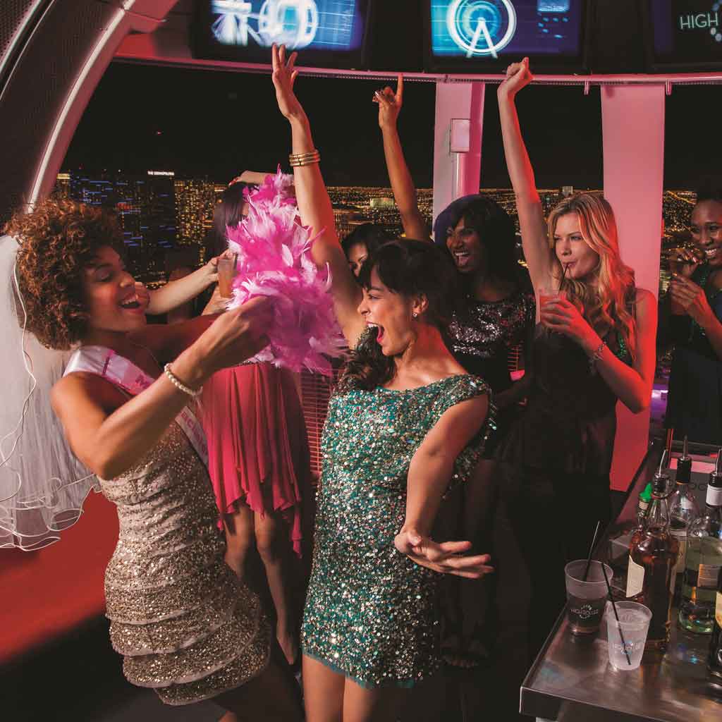 Photograph of a bachelorette party on the High Roller ferris wheel in Las Vegas.