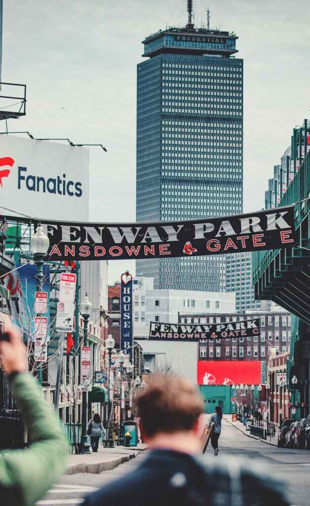 Landscape view of Gate E of Fenway Park with the Prudential tower in the background.