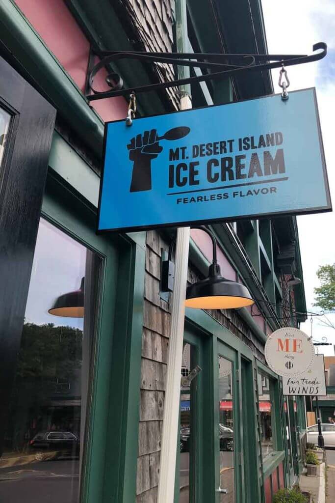 A photo of an ice cream shop sign that says "Mt. Desert Island Ice Cream Fearless Flavor."