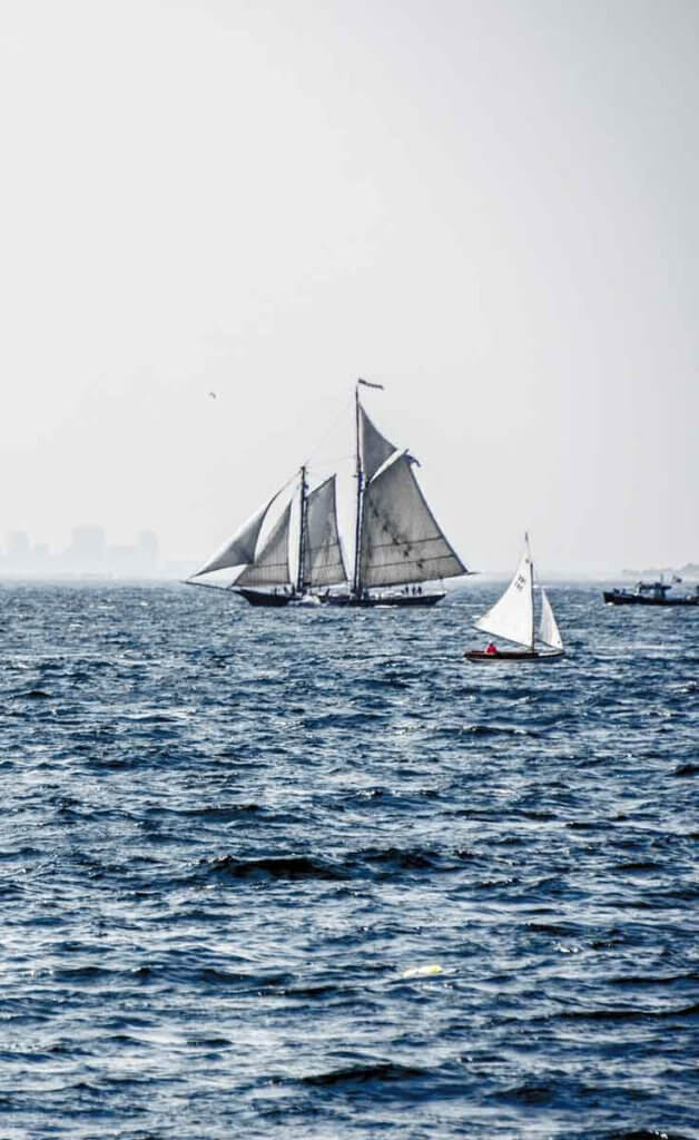 Sailboats off the coast of Gloucester, Massachusetts.