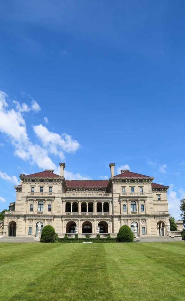 The Breakers mansion in Newport, RI, as pictured here, is one of many mansions you can tour on a day trip from Boston, MA.