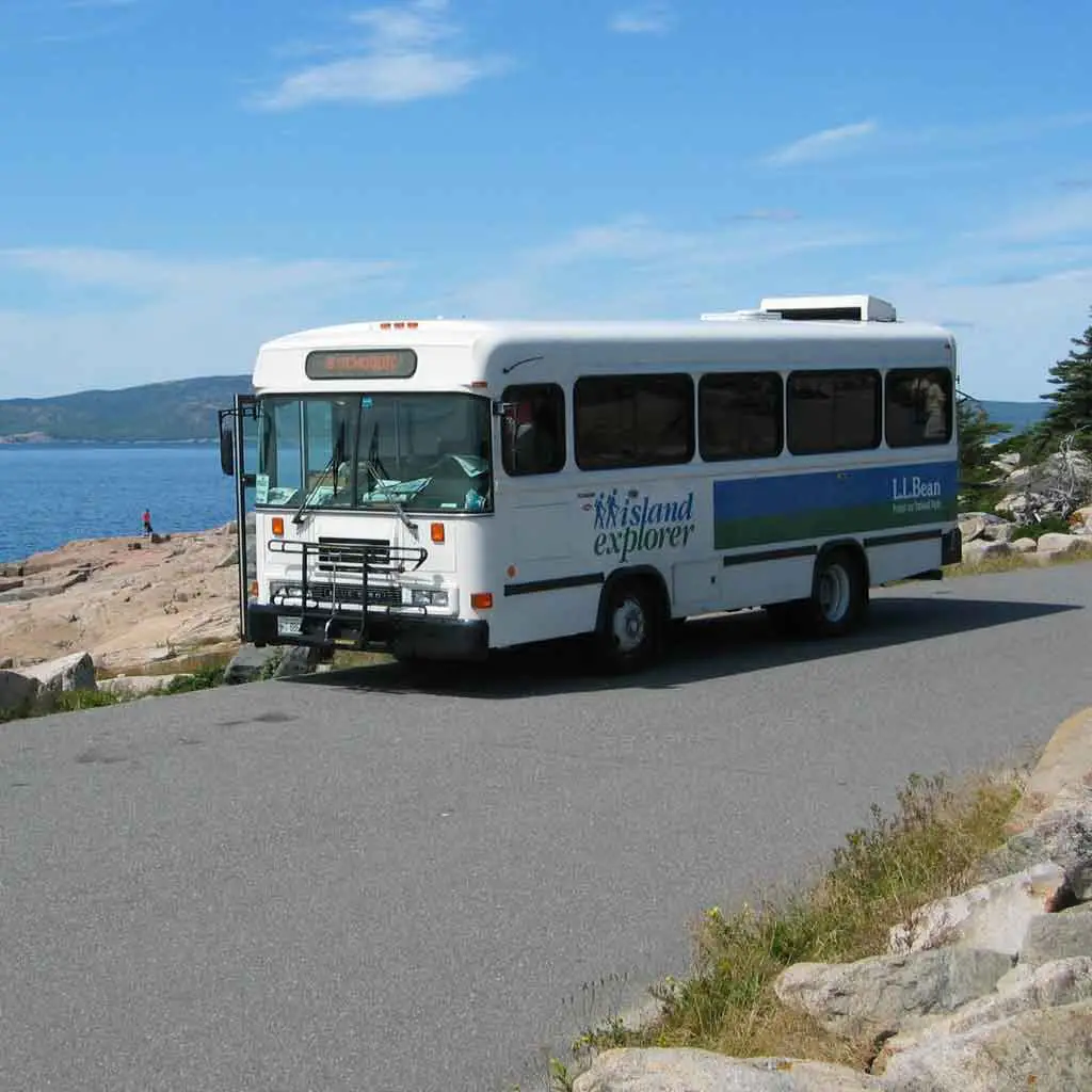 Photo of the Island Explorer bus pulled over on the side of a road.