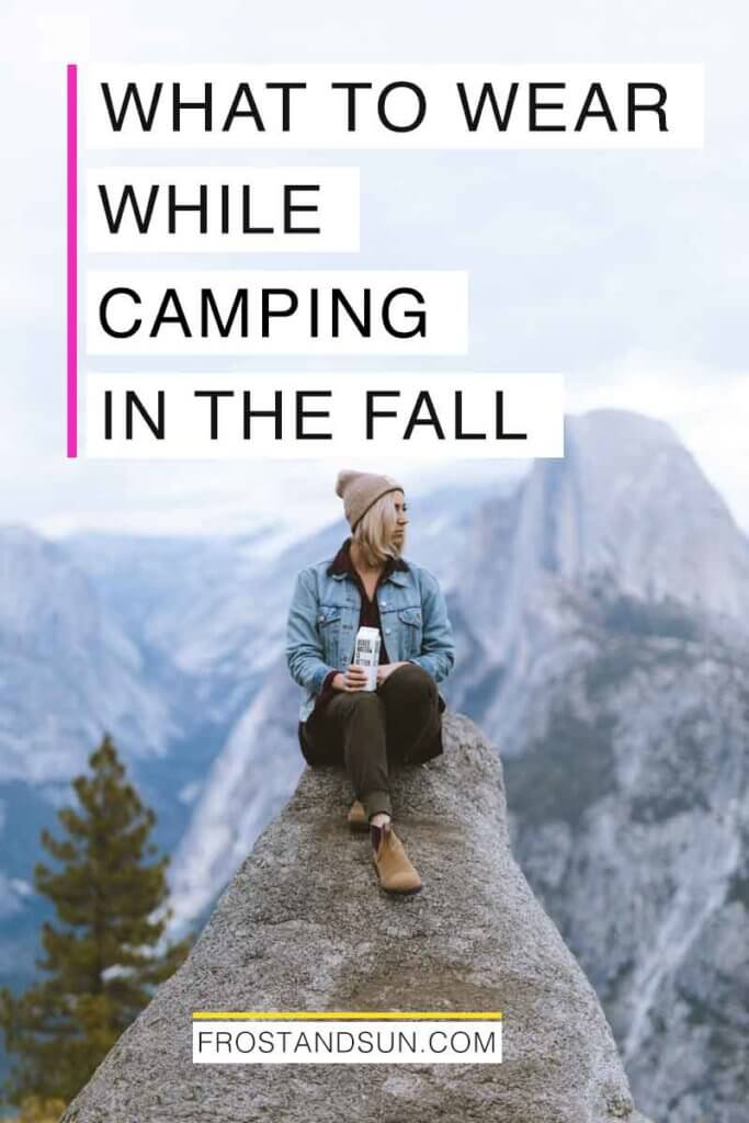 Photo of a woman sitting on a rock. Overlying text reads "What to Wear While Camping in the Fall."