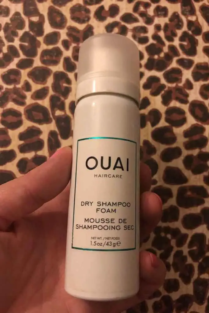 Photo of a travel sized can of Ouai Haircare Dry Shampoo Foam.