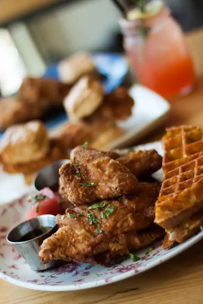 Closeup of a plate of fried chicken and waffles.