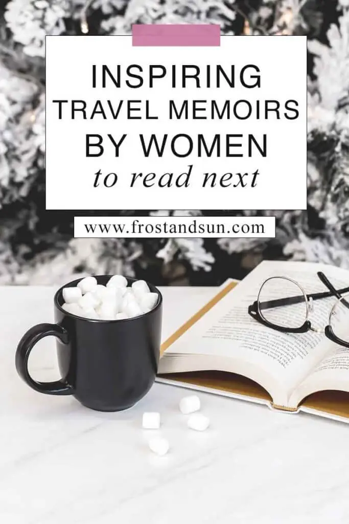 Closeup of an open book with reading glasses on top with a black mug with hot cocoa and marshmallows. Overlying text reads "Inspiring Travel Memoirs by Women to Read Next."