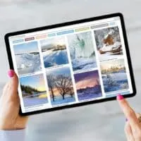 Closeup of a person holding an iPad tablet open to Pinterest, showing pinned Instagram images.