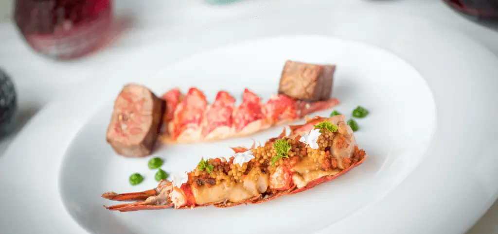 Closeup of steak and lobster from Restaurant Guy Savoy in Las Vegas.