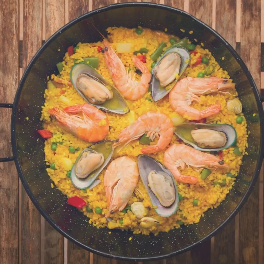 Closeup of a pan filled with paella from Barcelona, Spain.