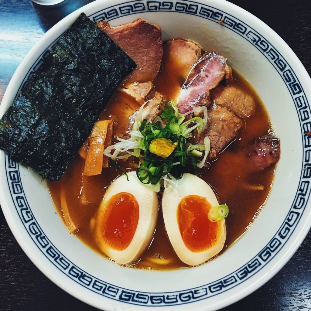 Closeup of a bowl of Japanese ramen soup.