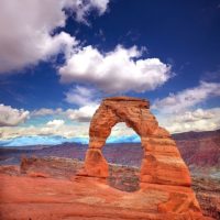 Closeup of a rock formed into an arch at Delicate Arch National Park in Utah.