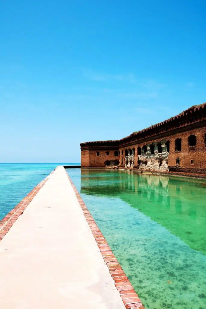Photo of a walkway parallel to Fort Jefferson at Dry Tortugas National Park in Florida.