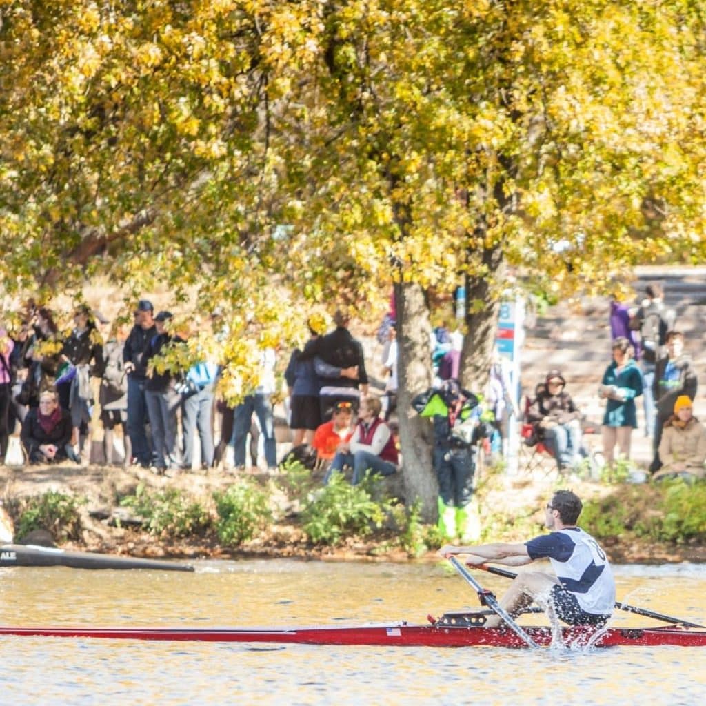 Photo of a man rowing in the Head of the Charles Regatta rowing race.