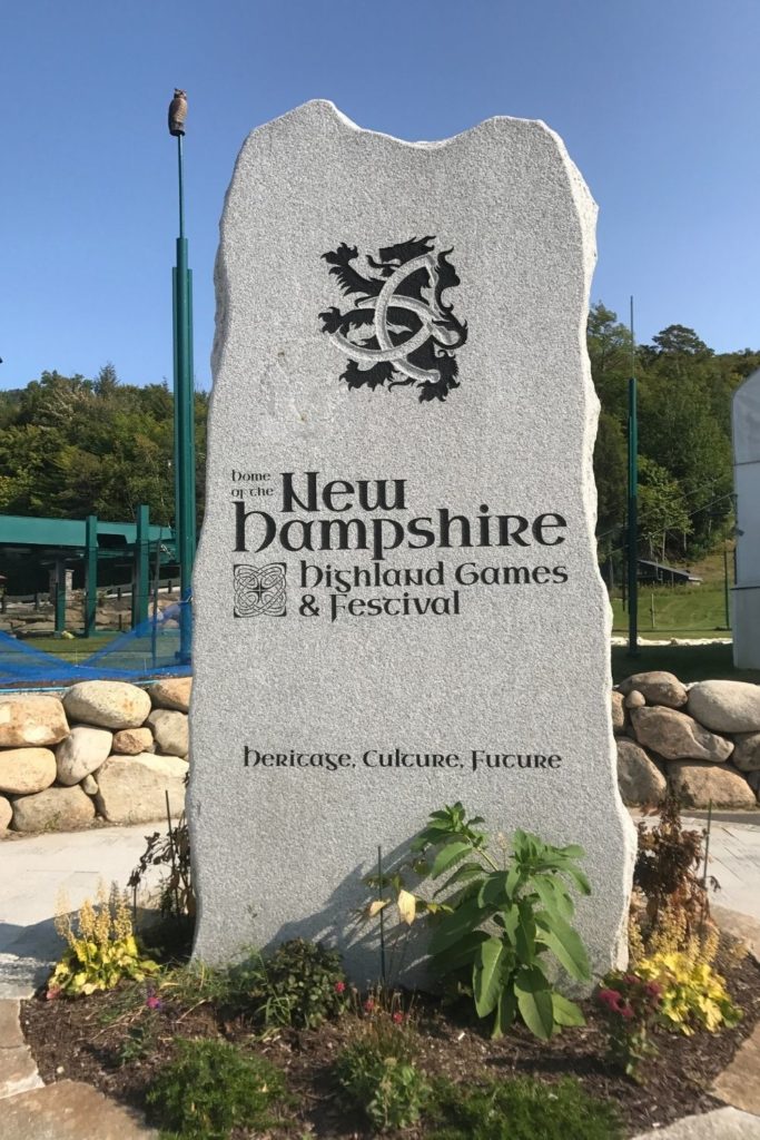 Photo of a stone slab with an engraving for the New Hampshire Highland Games & Festival.