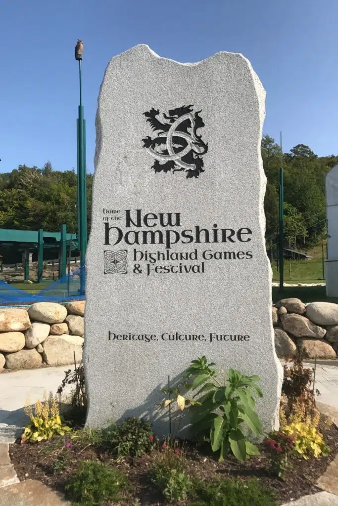 Photo of a stone slab with an engraving for the New Hampshire Highland Games & Festival.