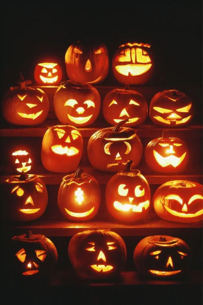 Close up photo of jack-o-lanterns light up over a series of 5 steps.