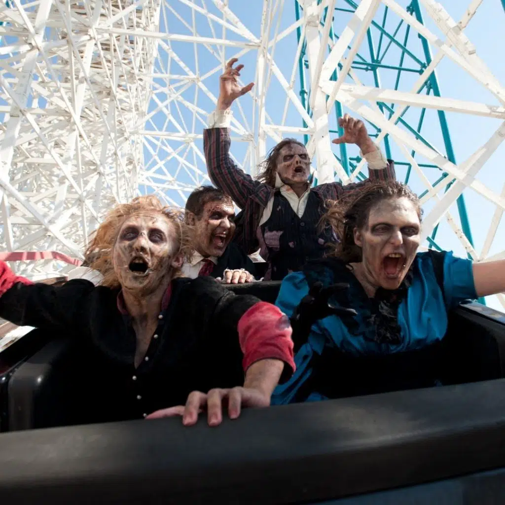 Photo of zombies riding a roller coaster at Six Flags Great Escape in New York.