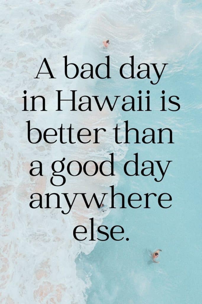 Aerial photo of a clear aqua ocean with 2 people swimming. Text overlay reads "A bad day in Hawaii is better than a good day anywhere else."