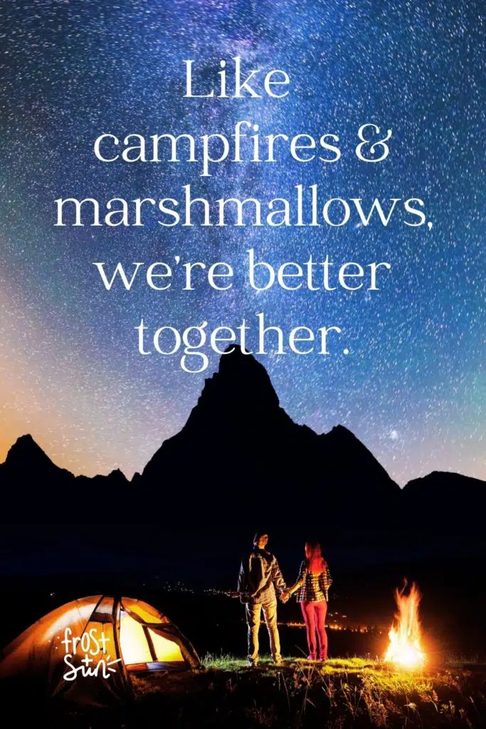 Photo of a couple holding hands at their campsite looking up a the Milky Way galaxy. Text overlay reads "Like campfires & marshmallows, we're better together."