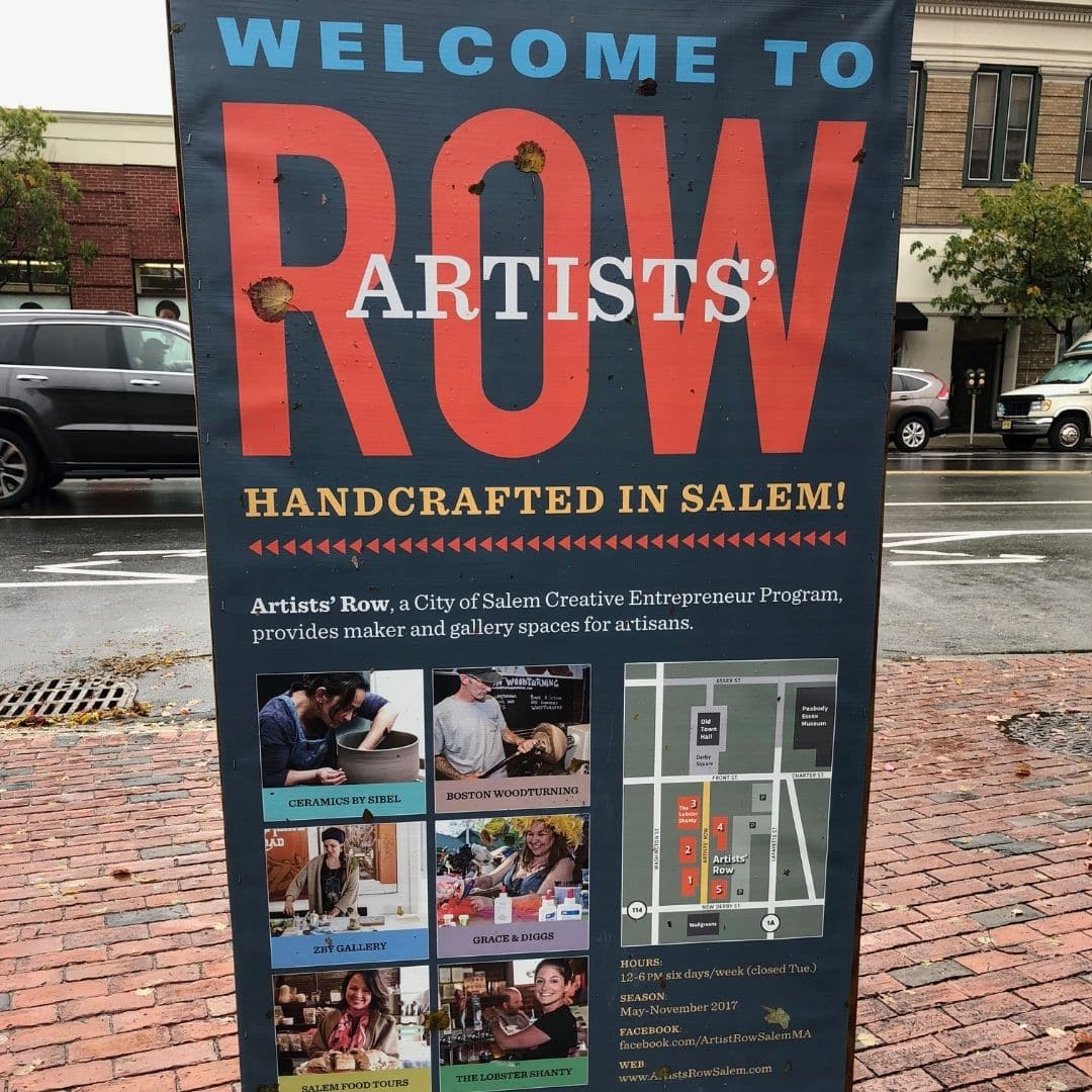 Photo of a sign advertising Artists' Row in Salem, MA.