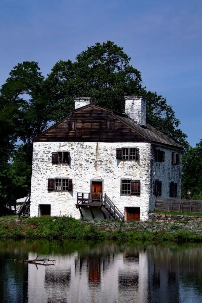 Photo of a historic white brick house in Sleepy Hollow village of Mount Pleasant, NY.