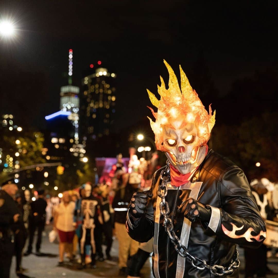 Photo of a person dressed as the Ghost Rider character with a flaming skull.