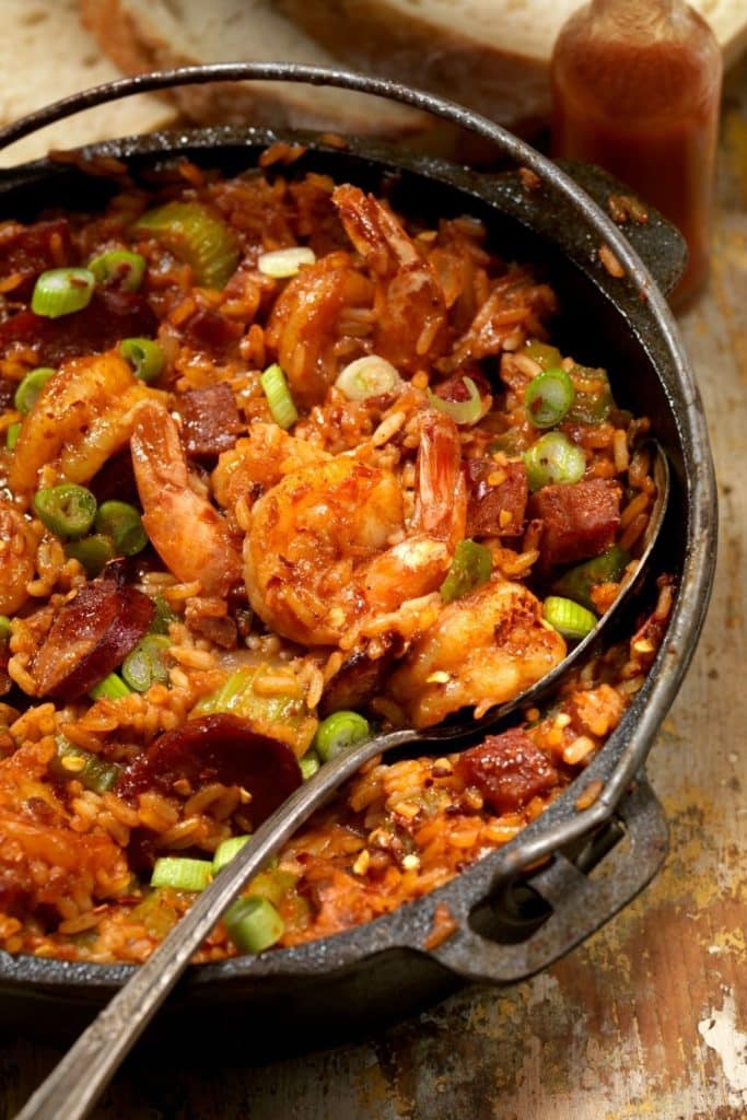 Photo of a large pot of jambalaya with shrimp and sausage.