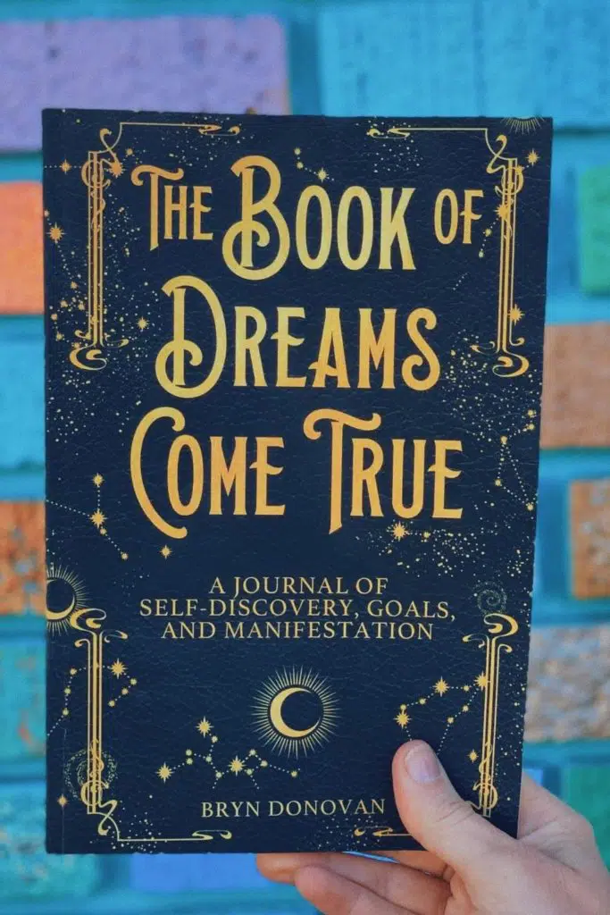 Photo of the book cover for "The Book of Dreams Come True" journal.