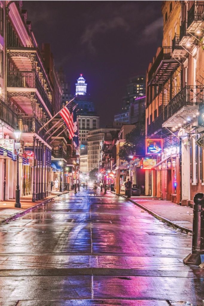 Photo of an empty Bourbon Street at night in New Orleans.
