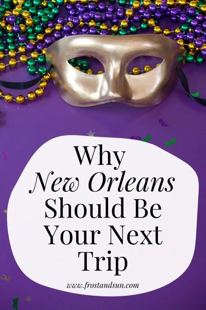 Photo of a gold mask placed near Mardi Gras beads. Text below the photo reads "Why New Orleans Should Be Your Next Trip."