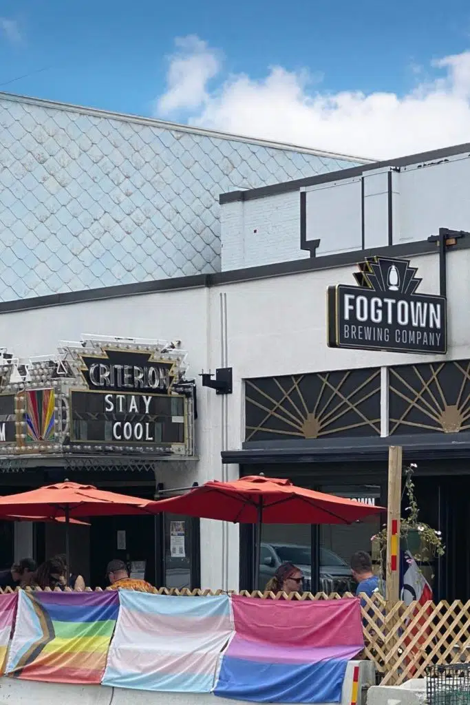 Photo of signage and outside seating for Fogtown Brewing Company in downtown Bar Harbor.