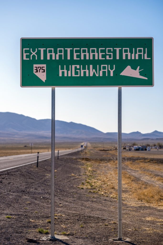 Photo of a sign on the side of a road that reads: Extraterrestrial Highway.