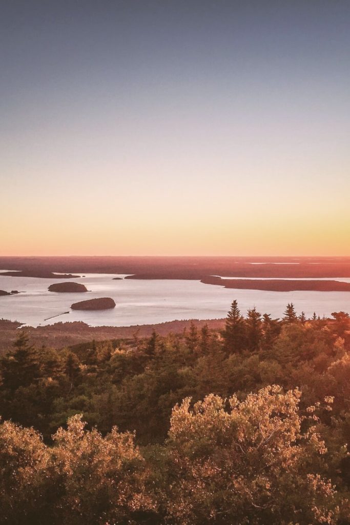 Photo from Cadillac Mountain during sunrise, looking out to the Porcupine Islands.