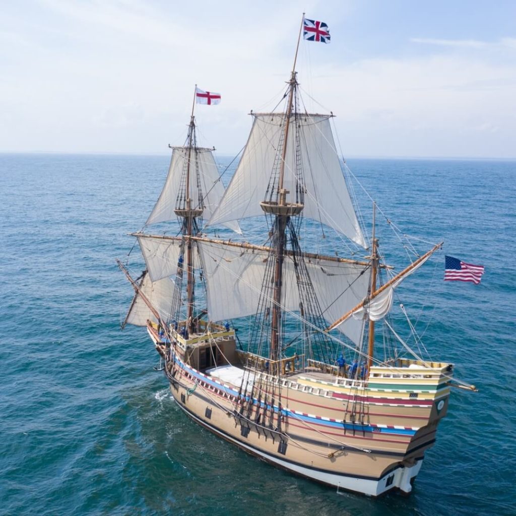 Photo of the Mayflower II ship replica sailing in the ocean.
