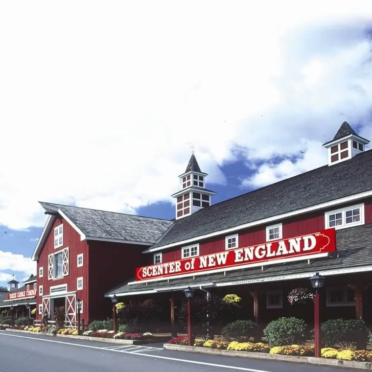 Photo of a red barn-like building at Yankee Candle Village in South Deerfield, MA.