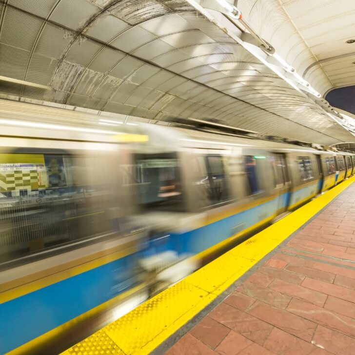 Photo of a blue line train arriving at State Street station in Boston.