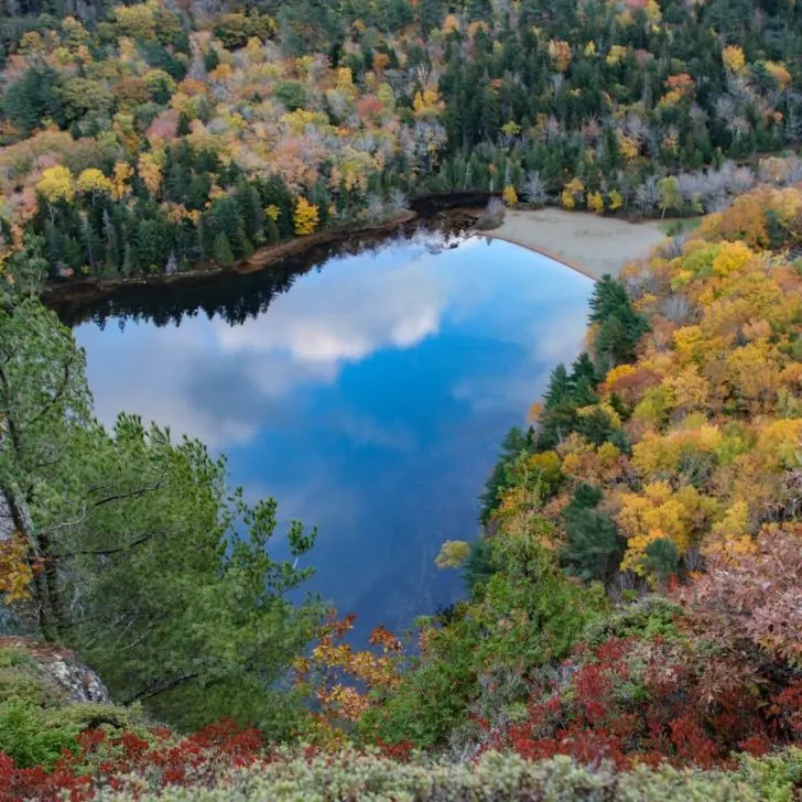 Photo from the top of Beech Mountain looking down at Echo Lake beach during the Fall season with colorful foliage.